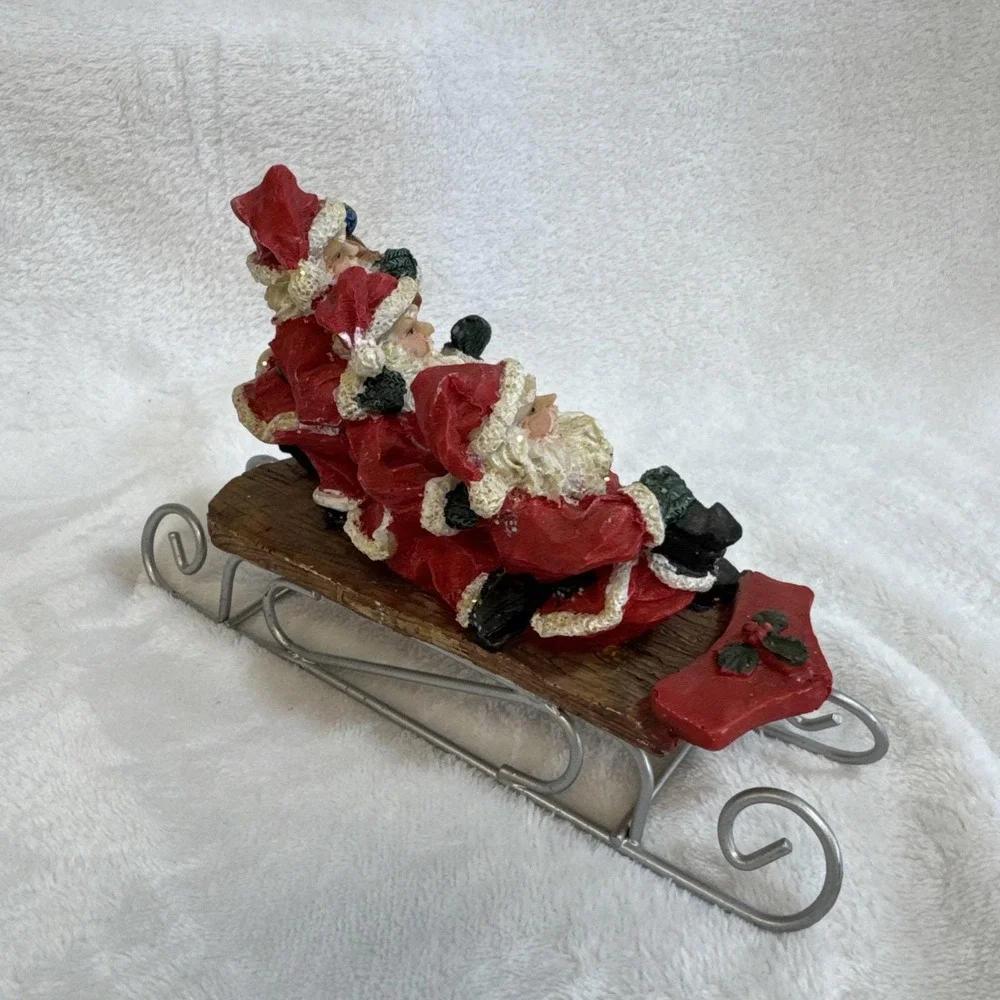 Three Jolly Santas‎ Riding On a Sled Christmas Figurine Vintage 90s